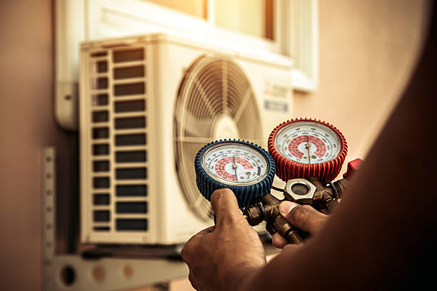 Professional Hvac technician working in Pluckemin, NJ
